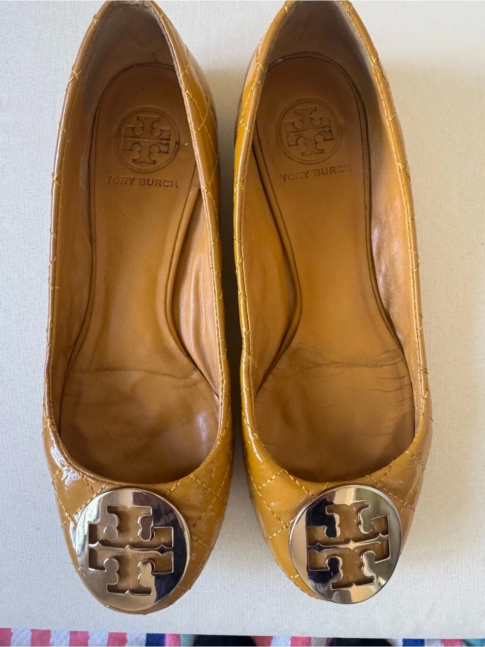 Tory Burch Quilted Mustard Leather Reva Flats with Logo Medallion